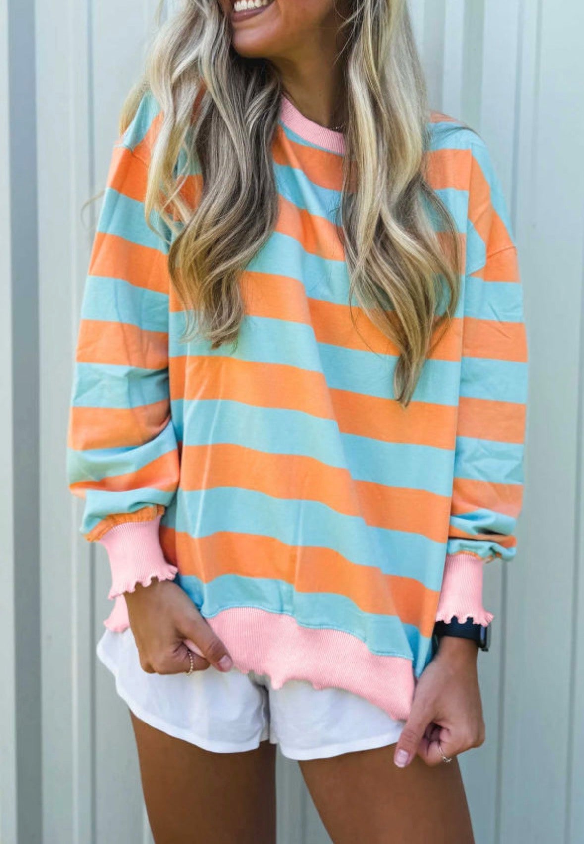 Orange and blue striped top