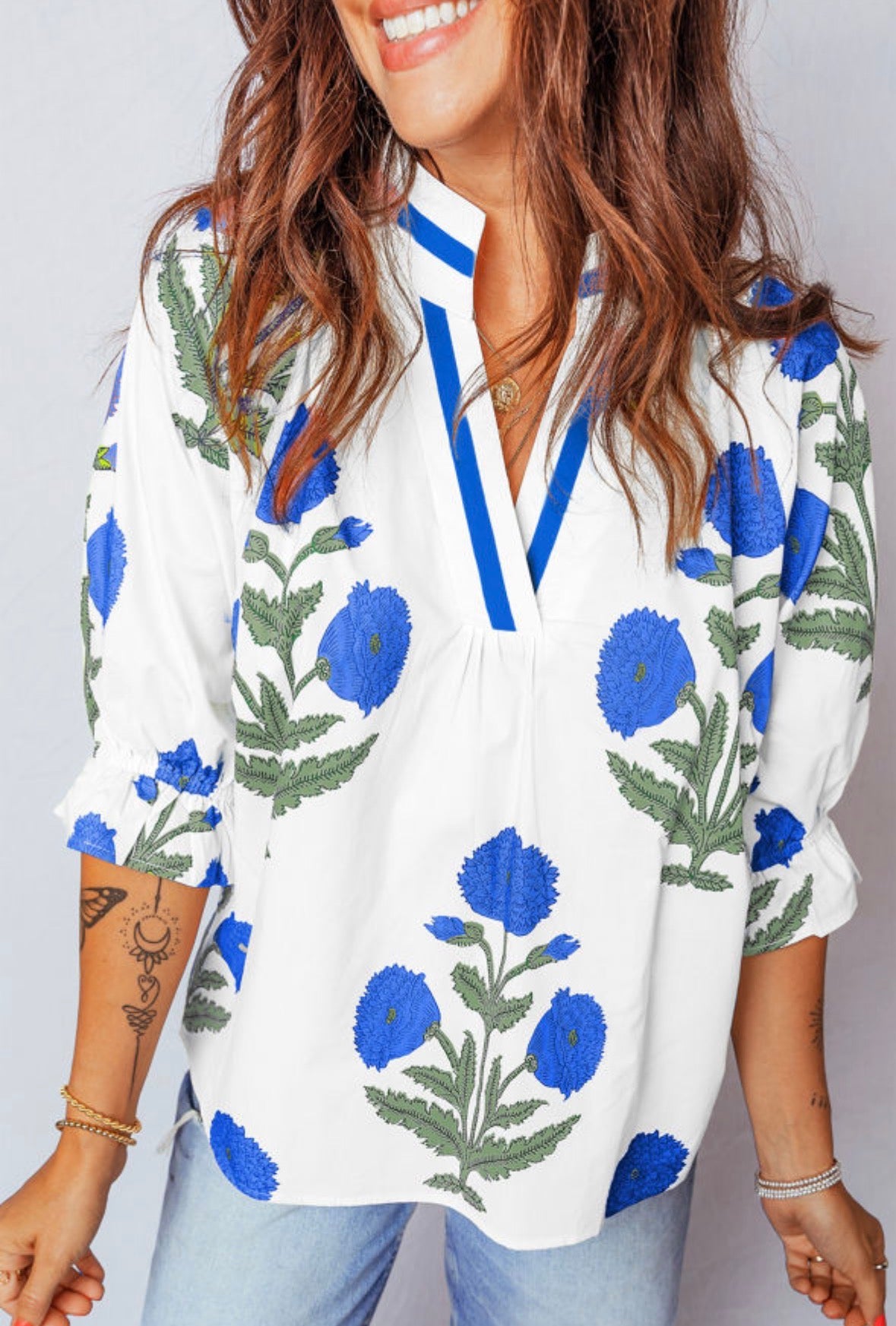 White and blue floral top